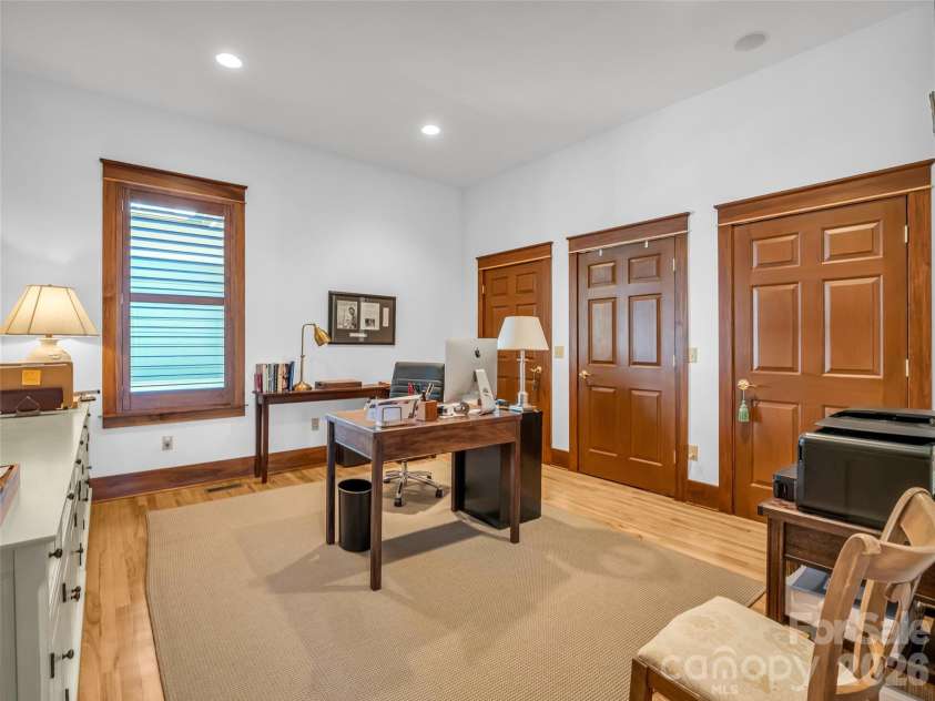 720 Overlook Drive, Flat Rock, NC 28731.  MLS# CAR4365121, YatesRealty ID 16429. Main-level bedroom—ideal for office or guest space
