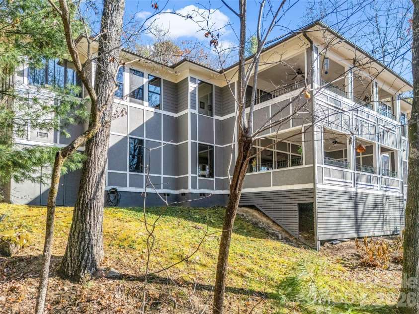 720 Overlook Drive, Flat Rock, NC 28731.  MLS# CAR4365121, YatesRealty ID 16429. Multi-level design with expansive covered 
