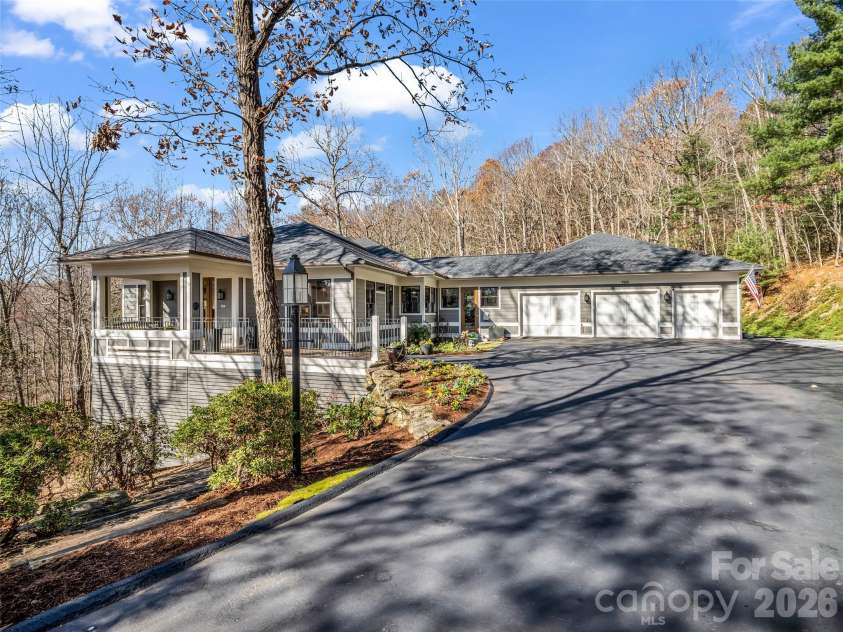 720 Overlook Drive, Flat Rock, NC 28731.  MLS# CAR4365121, YatesRealty ID 16429. Privately set with a level driveway in Kenmure