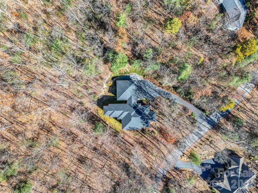 720 Overlook Drive, Flat Rock, NC 28731.  MLS# CAR4365121, YatesRealty ID 16429. Surrounded by natural mountain landscape