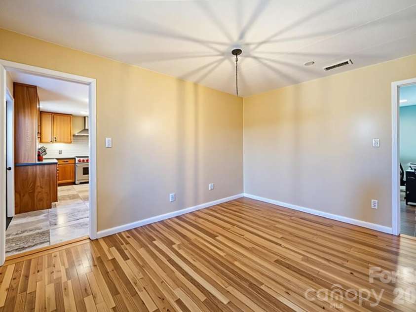 39 Pershing Road, Asheville, NC 28805.  MLS# CAR4340003, YatesRealty ID 16431. Virtually Cleared Dining Room