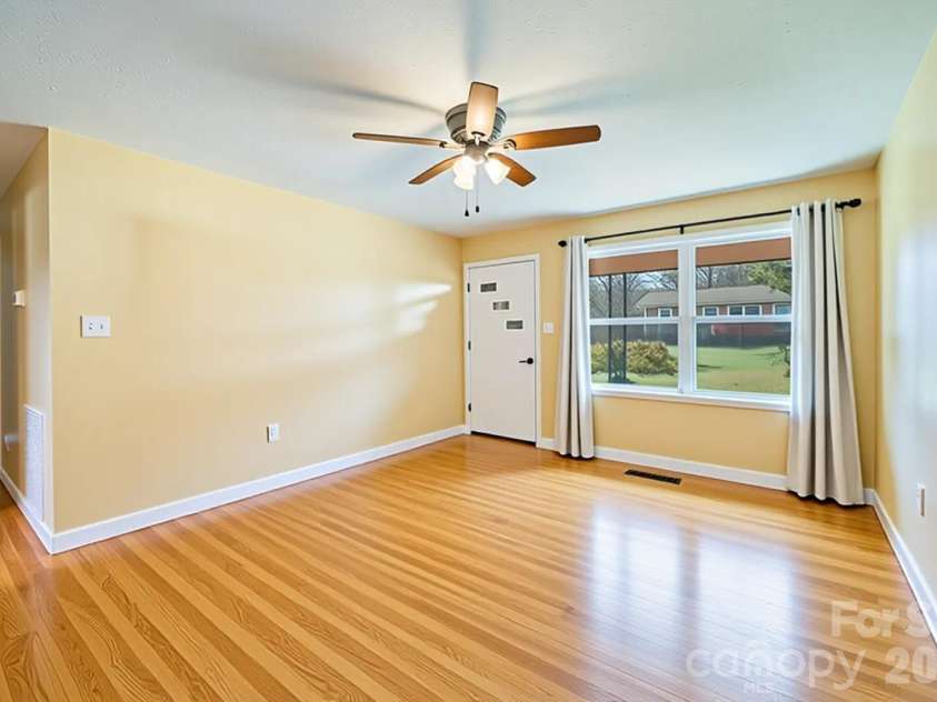 39 Pershing Road, Asheville, NC 28805.  MLS# CAR4340003, YatesRealty ID 16431. Virtually Cleared Living Room View 2