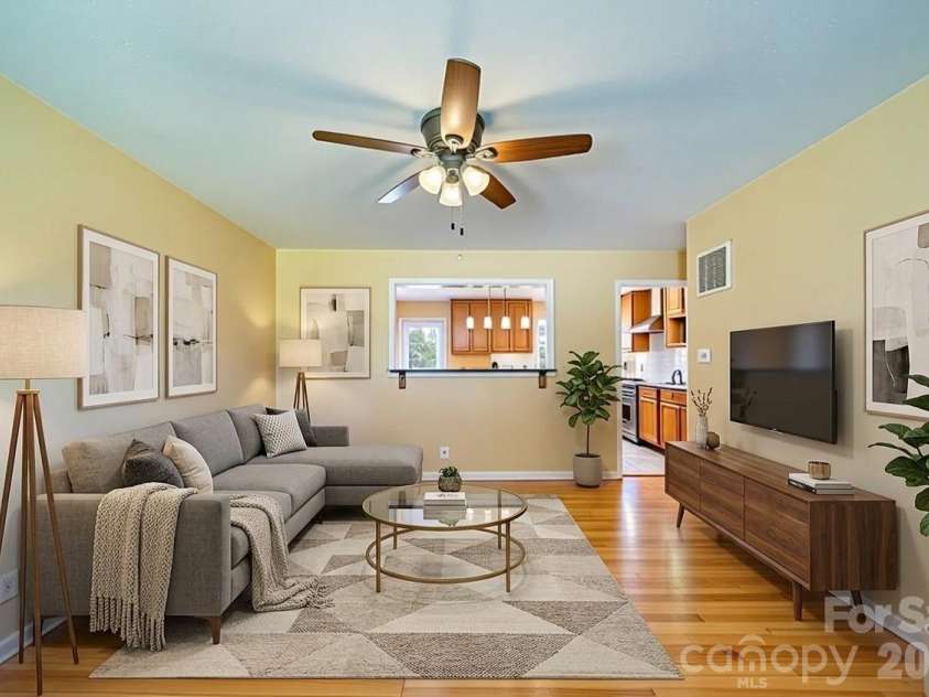 39 Pershing Road, Asheville, NC 28805.  MLS# CAR4340003, YatesRealty ID 16431. Virtually Staged Living Room