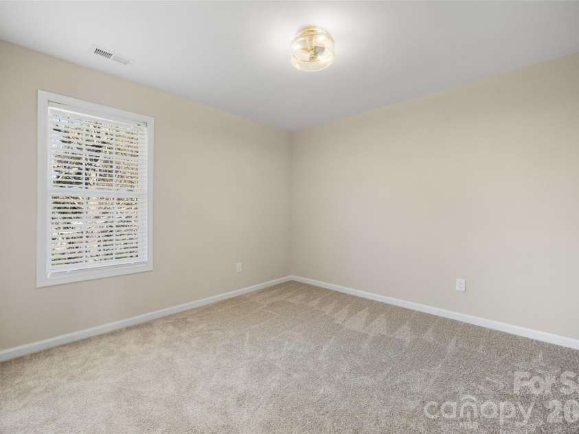 2912 Tallard Lane, Charlotte, NC 28270.  MLS# CAR4336197, YatesRealty ID 16432. Designer Lighted Ceiling Fan