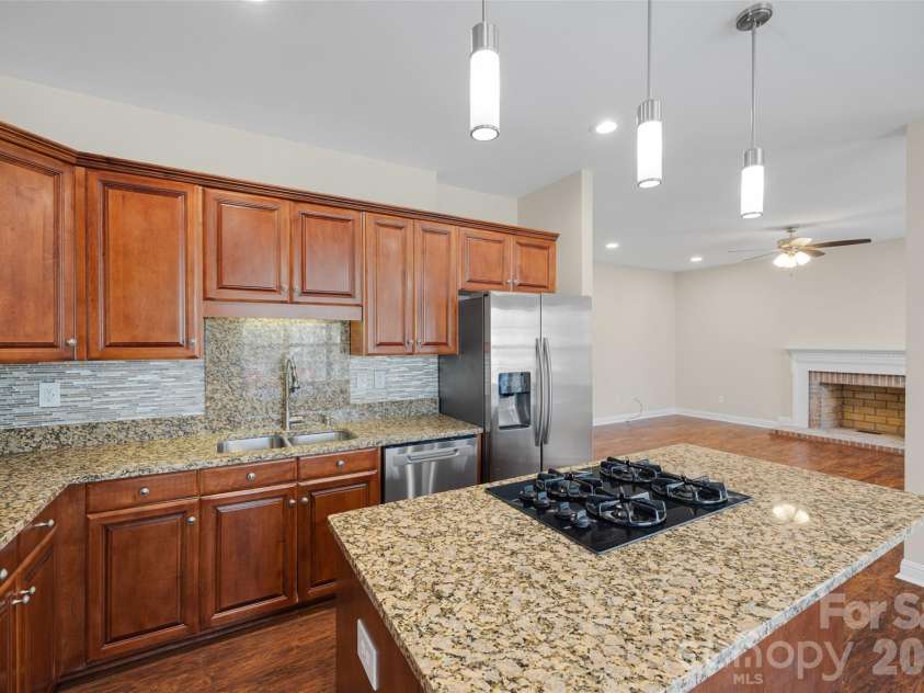 2912 Tallard Lane, Charlotte, NC 28270.  MLS# CAR4336197, YatesRealty ID 16432. Gather Around The Kitchen!