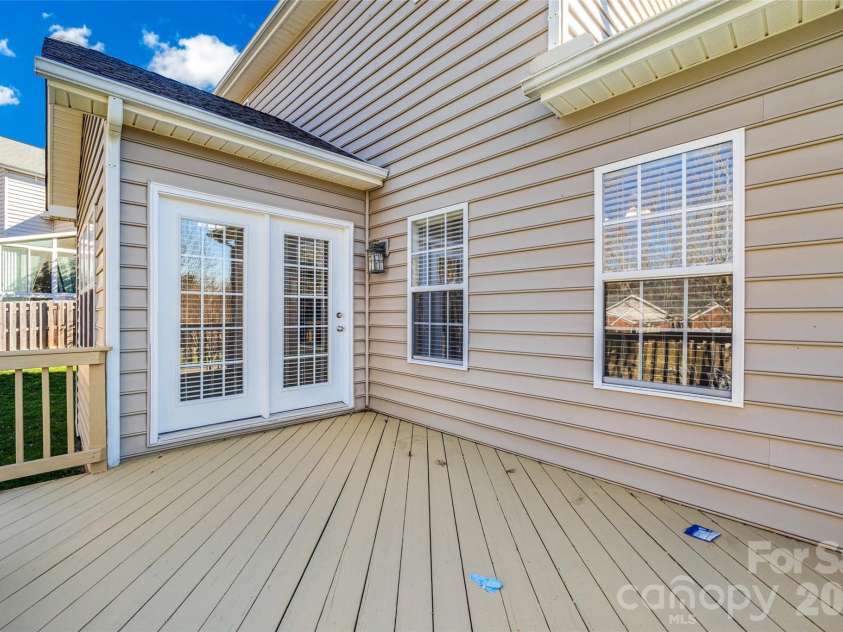 2912 Tallard Lane, Charlotte, NC 28270.  MLS# CAR4336197, YatesRealty ID 16432. Kitchen Leads to Spacious Deck