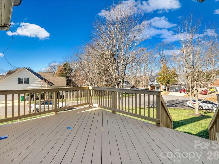 2912 Tallard Lane, Charlotte, NC 28270.  MLS# CAR4336197, YatesRealty ID 16432. Large Deck Overlooks Beautiful Back Yard