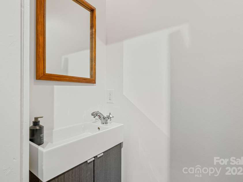 21 Sylvan Avenue, Asheville, NC 28801.  MLS# CAR4300108, YatesRealty ID 16433. Powder Room on Main Level 