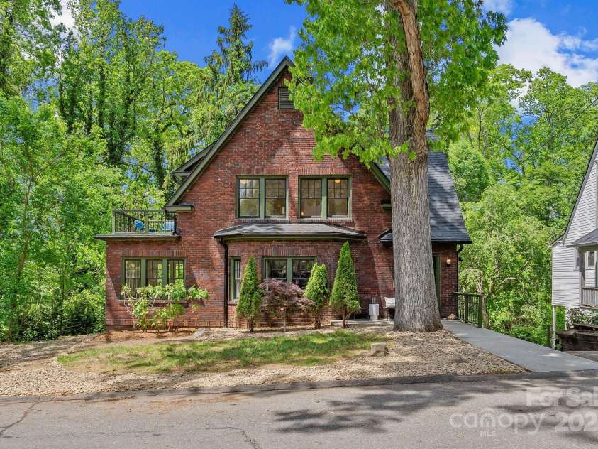 21 Sylvan Avenue, Asheville, NC 28801.  MLS# CAR4300108, YatesRealty ID 16433. Stunning Montford Tudor-Style Home