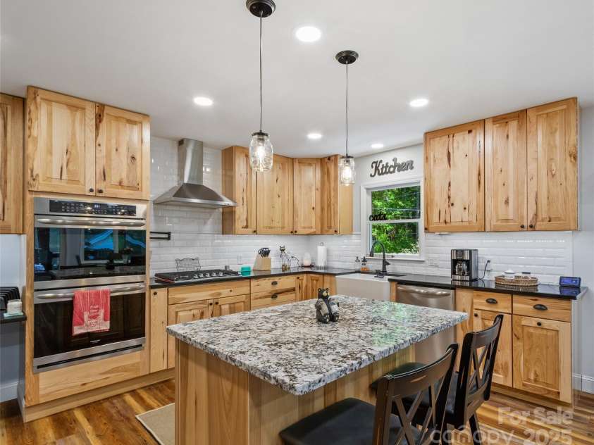 1493 Upper Browns Creek Road, Burnsville, NC 28714.  MLS# CAR4261029, YatesRealty ID 16437. Beautiful hickory cabinets