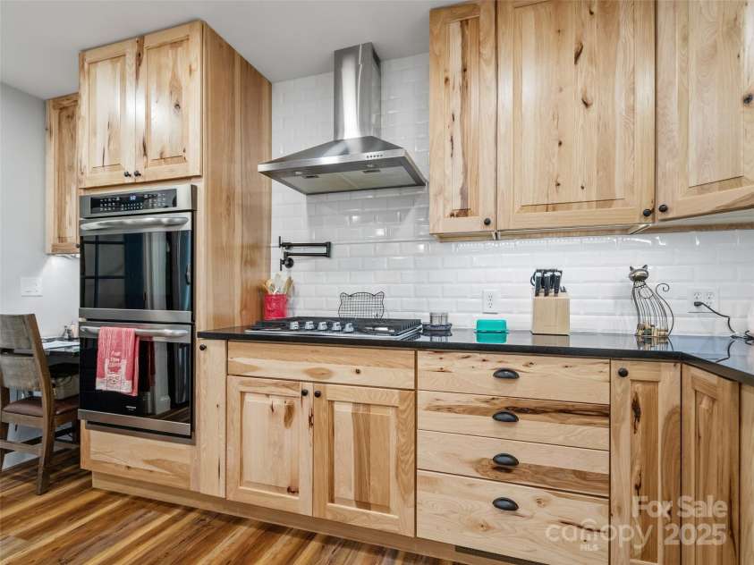 1493 Upper Browns Creek Road, Burnsville, NC 28714.  MLS# CAR4261029, YatesRealty ID 16437. Gas range with pot filler!