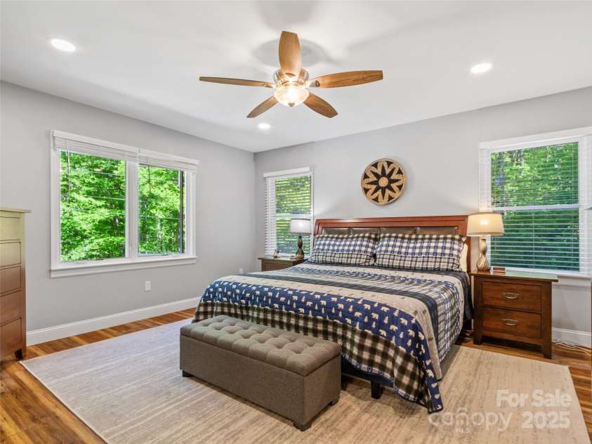 1493 Upper Browns Creek Road, Burnsville, NC 28714.  MLS# CAR4261029, YatesRealty ID 16437. Primary bedroom on the main floor, crack the window to enjoy the sounds of brown creek