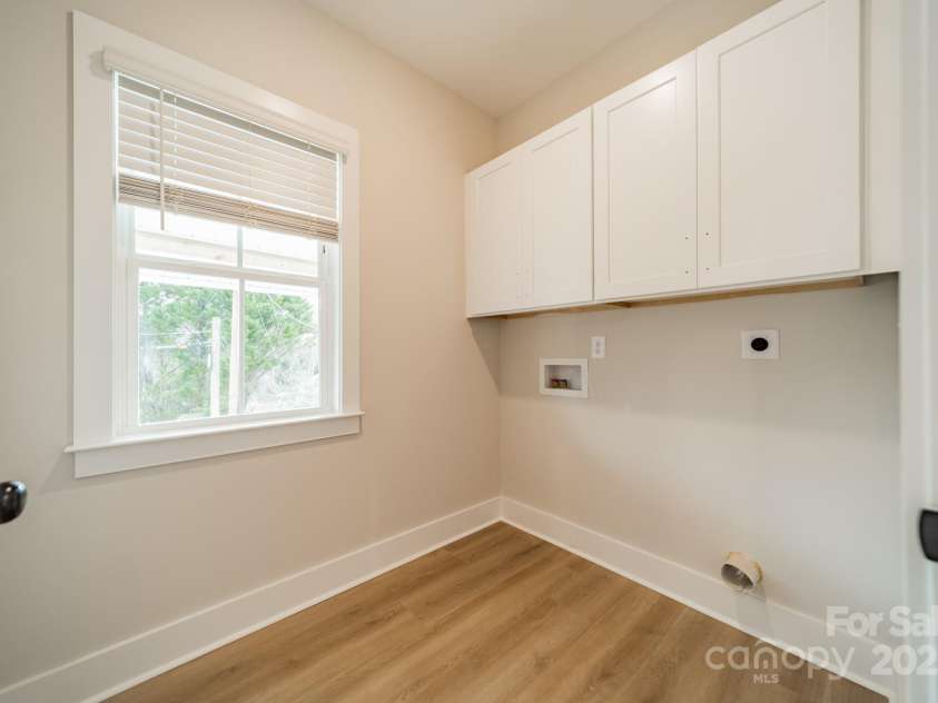 576 Reid Street, Belmont, NC 28012.  MLS# CAR4228458, YatesRealty ID 16438. Laundry room