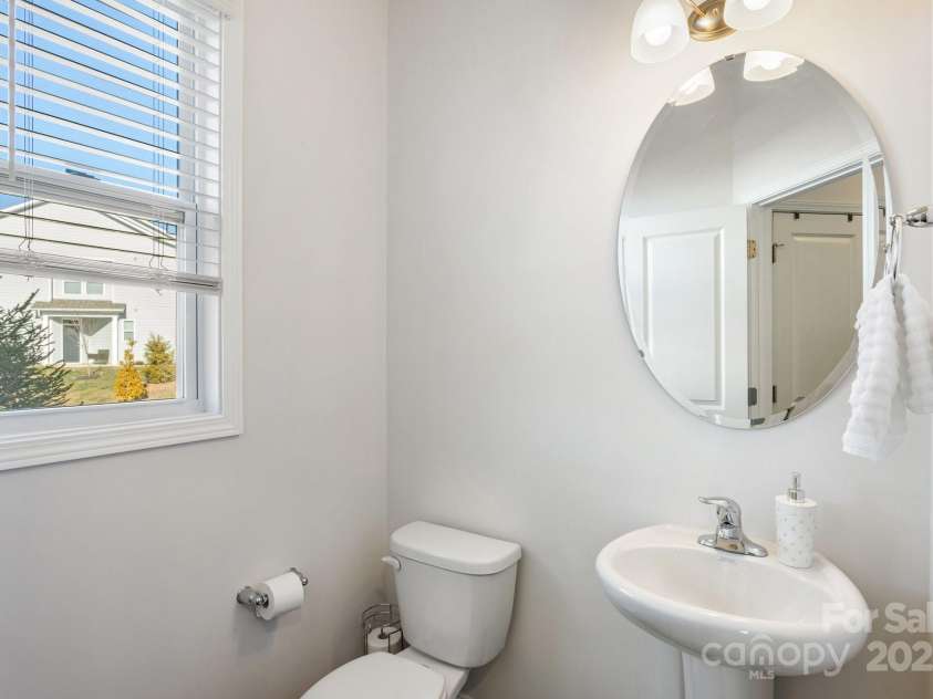 108 Creekview Road, Hendersonville, NC 28792.  MLS# CAR4209985, YatesRealty ID 16439. Half bath on main level