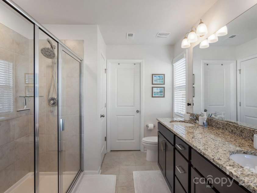 108 Creekview Road, Hendersonville, NC 28792.  MLS# CAR4209985, YatesRealty ID 16439. Primary bathroom complete with walk in closet