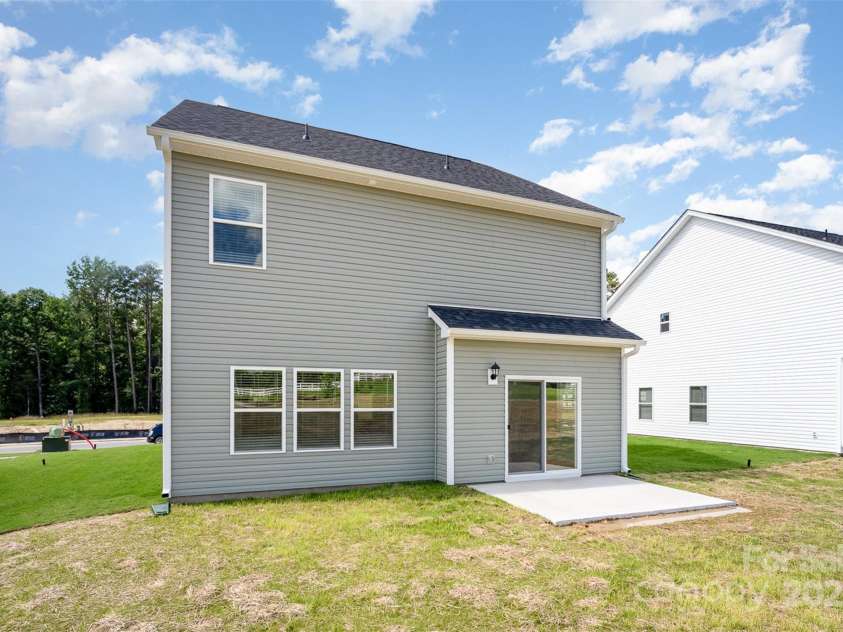 1205 Cathey Road, Charlotte, NC 28214.  MLS# CAR4275203, YatesRealty ID 1644. Back yard & back patio. Representational Photo