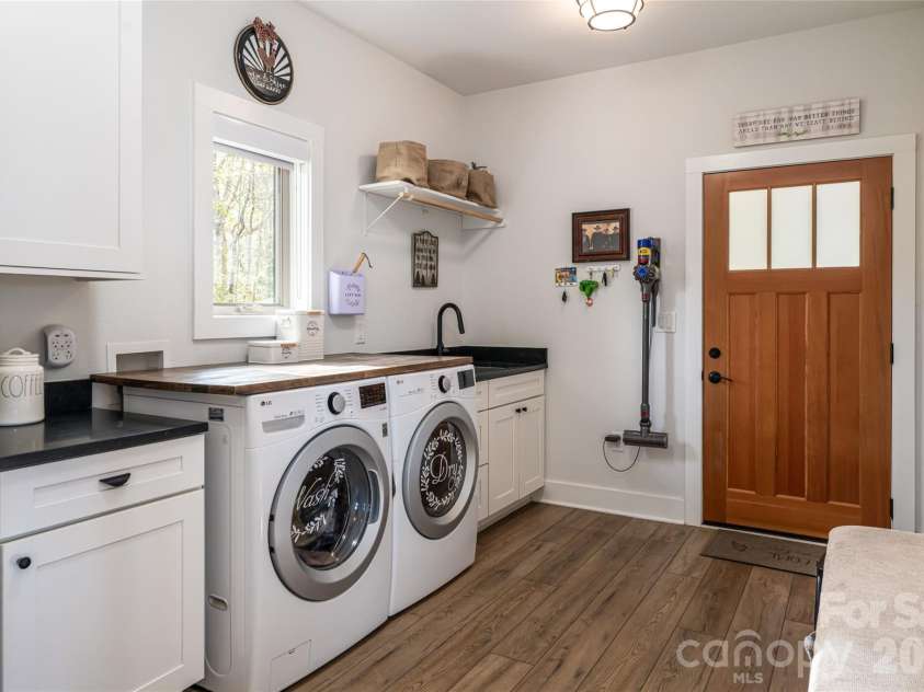 366 Signature Row Boulevard, Waynesville, NC 28785.  MLS# CAR4373679, YatesRealty ID 16440. Main level laundry room
