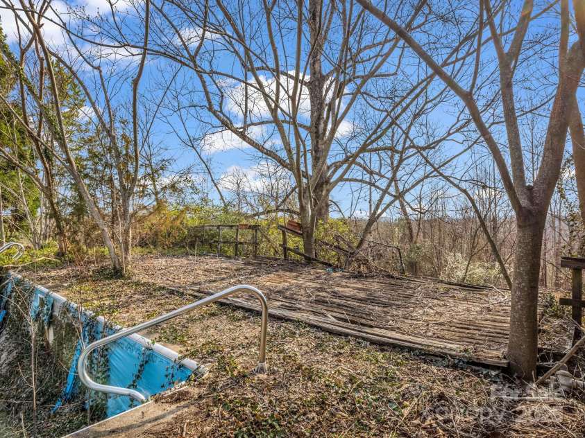 6 Rachel Bell Road, Mill Spring, NC 28756.  MLS# CAR4311830, YatesRealty ID 16446. Deck needs to be removed/replaced.