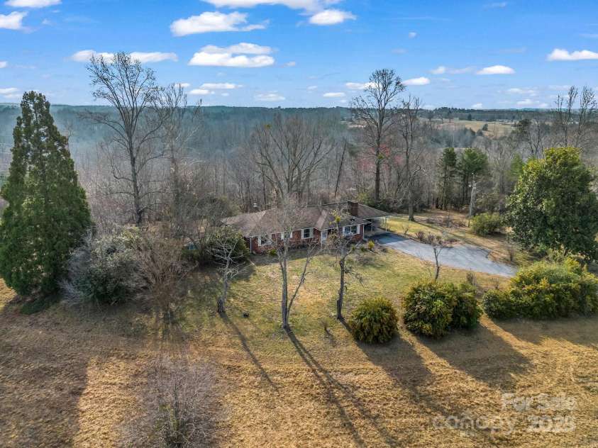 6 Rachel Bell Road, Mill Spring, NC 28756.  MLS# CAR4311830, YatesRealty ID 16446. Drone pic of home