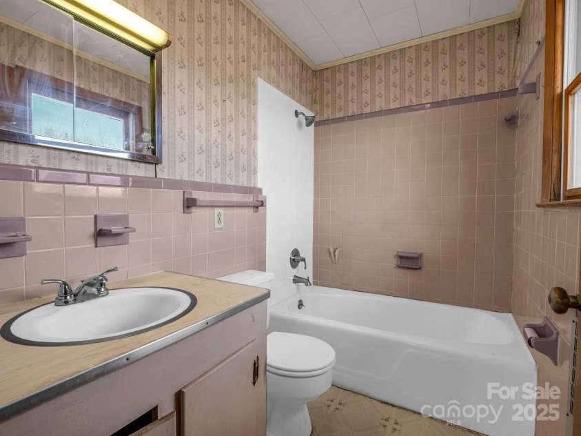 6 Rachel Bell Road, Mill Spring, NC 28756.  MLS# CAR4311830, YatesRealty ID 16446. Primary Bath needs updates