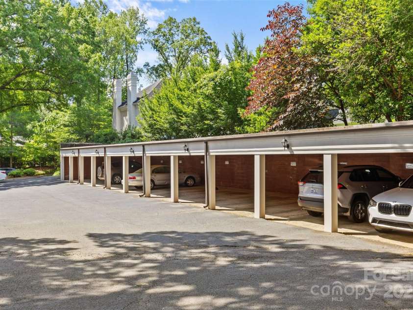 108 Colville Road, Charlotte, NC 28207.  MLS# CAR4233402, YatesRealty ID 16447. Deeded carport space is #7.