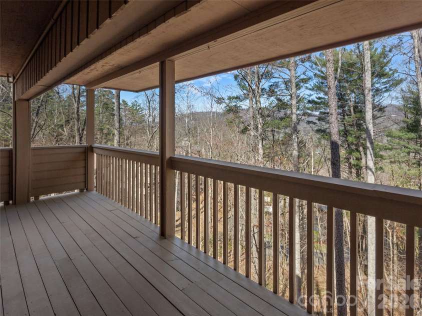 3501 Timber Trail, Asheville, NC 28804.  MLS# CAR4357759, YatesRealty ID 16447. Covered lower level deck.