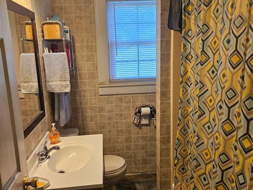 515 Benton Street, Monroe, NC 28110.  MLS# CAR4253864, YatesRealty ID 16448. Bathroom