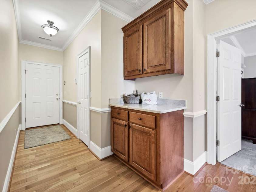 2102 Lake Road, Ridgeway, SC 29130.  MLS# CAR4256737, YatesRealty ID 16450. Drop zone and storage from Upper-level garage.