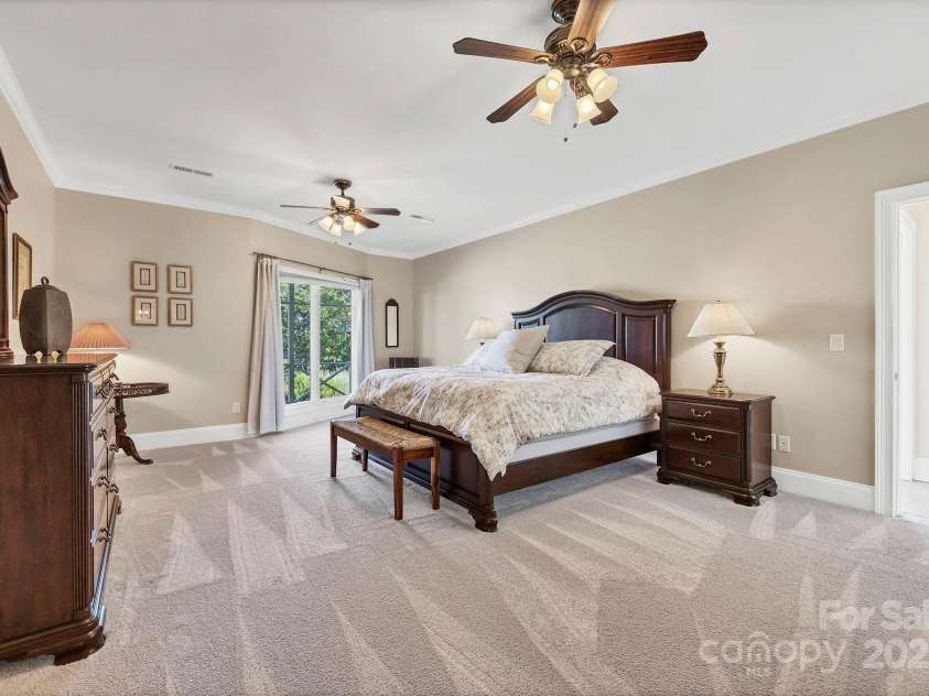 2102 Lake Road, Ridgeway, SC 29130.  MLS# CAR4256737, YatesRealty ID 16450. Main level Primary bedroom