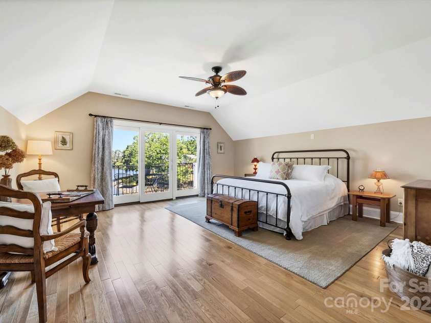 2102 Lake Road, Ridgeway, SC 29130.  MLS# CAR4256737, YatesRealty ID 16450. Upper level Bedroom features its own balcony overlooking the lake.