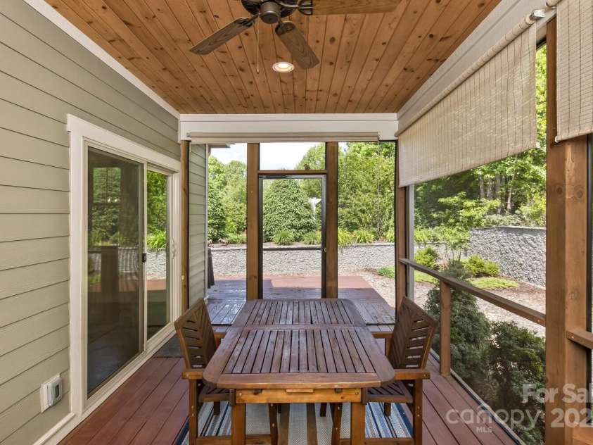 140 Shadowleaf Drive, Hendersonville, NC 28739.  MLS# CAR4254625, YatesRealty ID 16452. Screened in porch