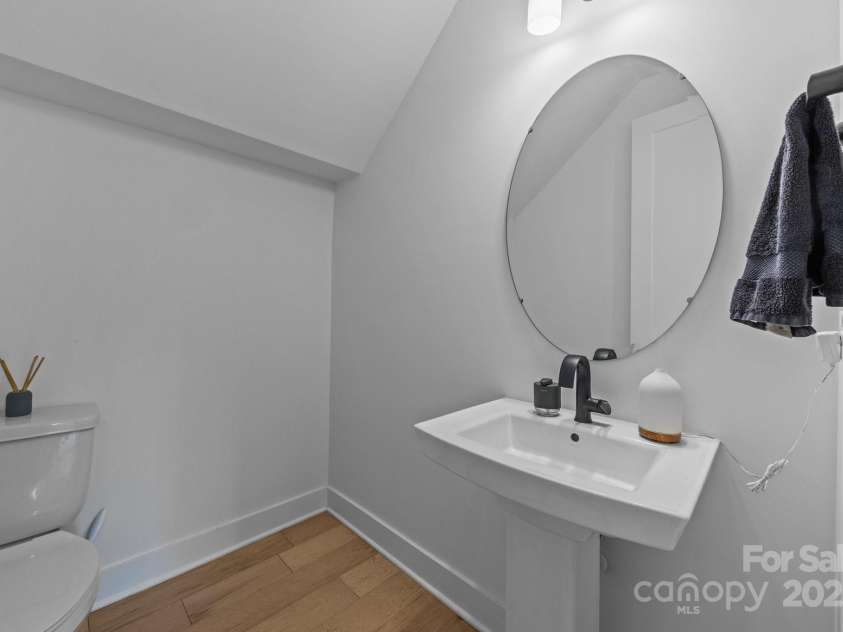 6032 Corbin Woods Court, Charlotte, NC 28226.  MLS# CAR4263567, YatesRealty ID 16456. Downstairs Half Bath