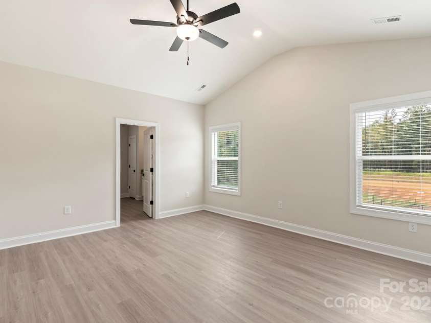 104 Kennford Trail, Troutman, NC 28166.  MLS# CAR4326104, YatesRealty ID 1646. Master bedroom