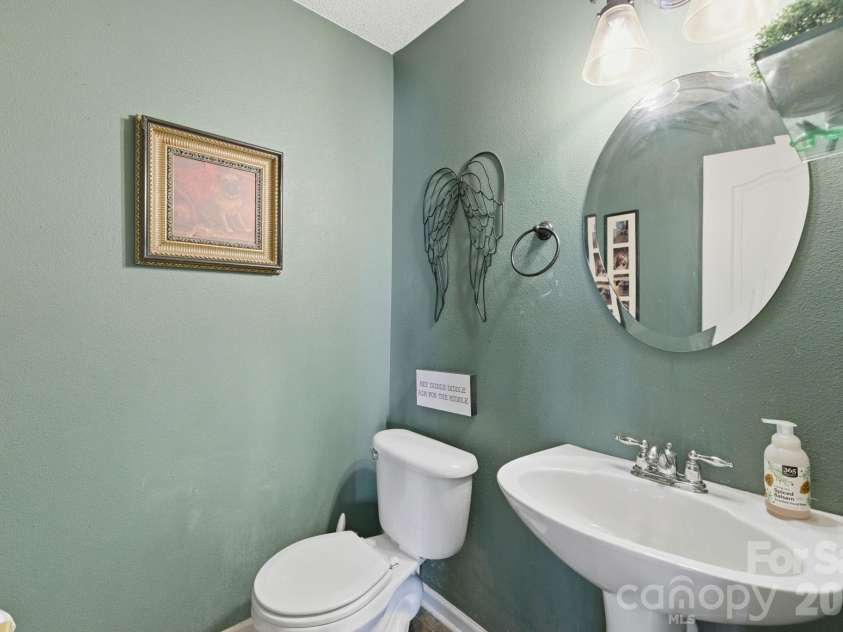 2028 Harrison Park Drive, Waxhaw, NC 28173.  MLS# CAR4367987, YatesRealty ID 16465. Half bath on main level