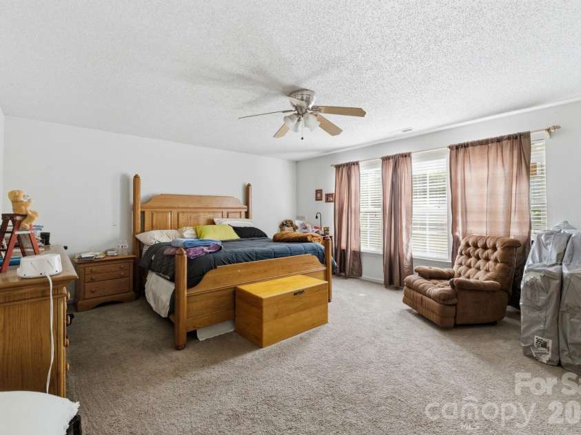 2028 Harrison Park Drive, Waxhaw, NC 28173.  MLS# CAR4367987, YatesRealty ID 16465. Primary bedroom