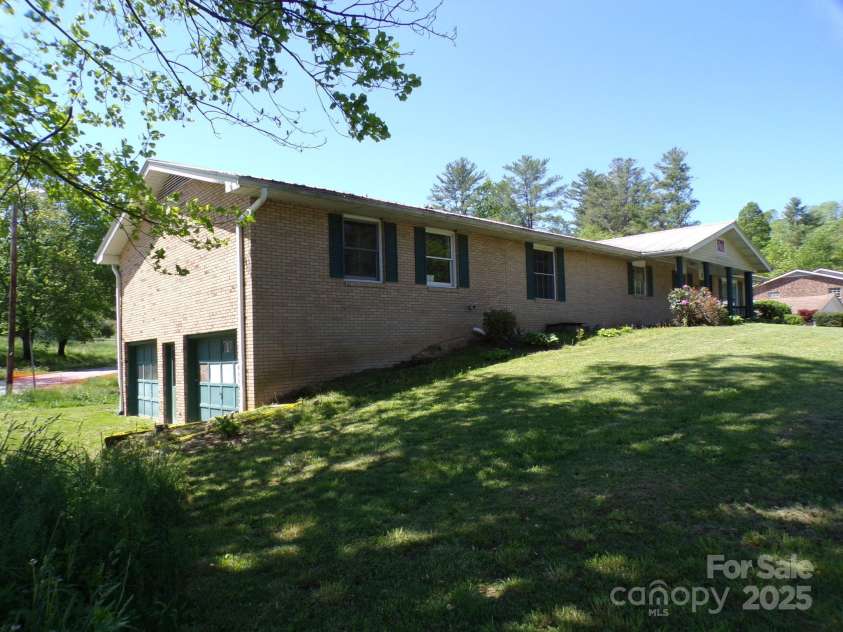 51 Fletcher View Drive, Fletcher, NC 28732.  MLS# CAR4252220, YatesRealty ID 16467. Side front view