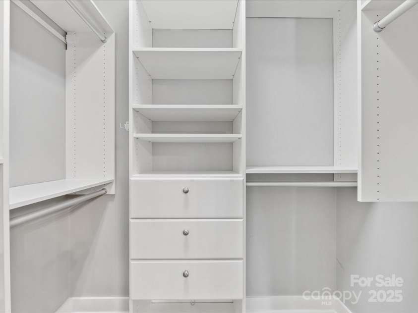 2709 Yadkin Avenue, Charlotte, NC 28205.  MLS# CAR4238325, YatesRealty ID 16469. Custom Built In shelving in walk-in closet