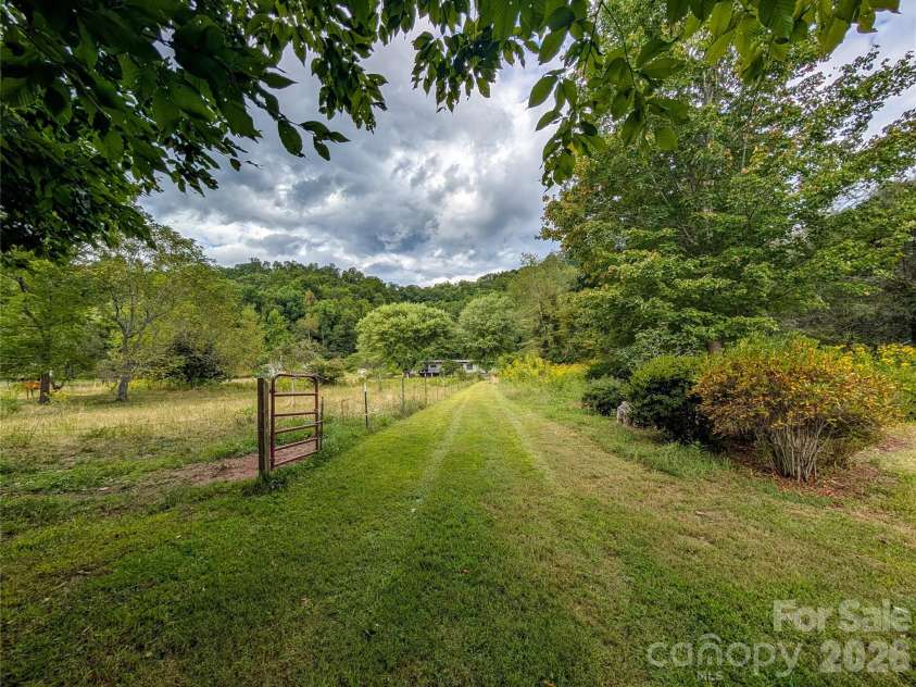 165 Cattail Creek Road, Burnsville, NC 28714.  MLS# CAR4298888, YatesRealty ID 16473. 