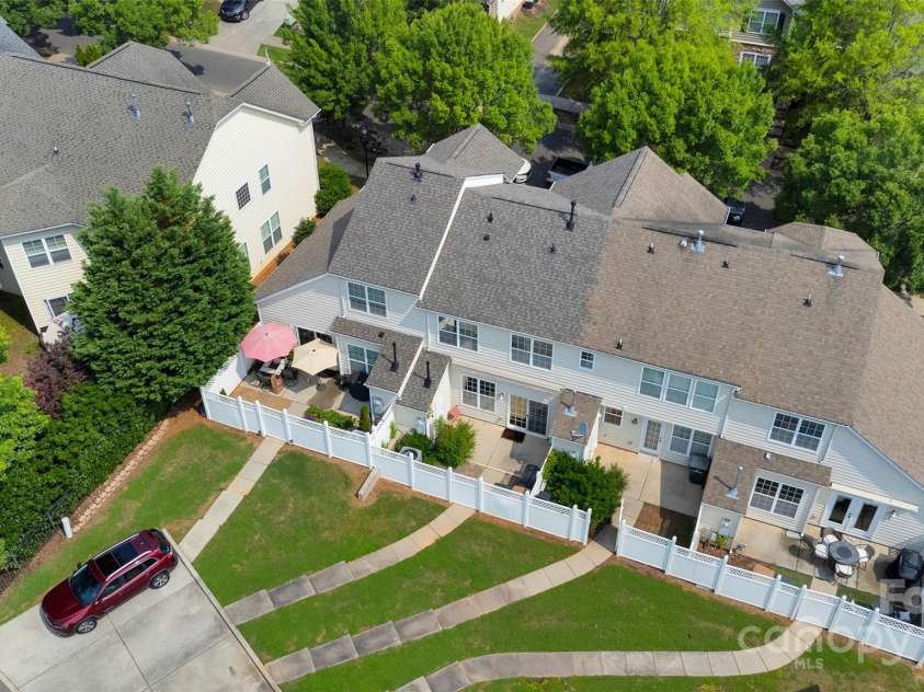 8009 Whitehawk Hill Road, Waxhaw, NC 28173.  MLS# CAR4232872, YatesRealty ID 16475. Aerial view of back of home.