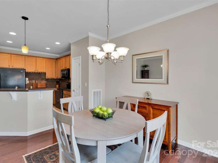 8009 Whitehawk Hill Road, Waxhaw, NC 28173.  MLS# CAR4232872, YatesRealty ID 16475. Bright and airy dining area.
