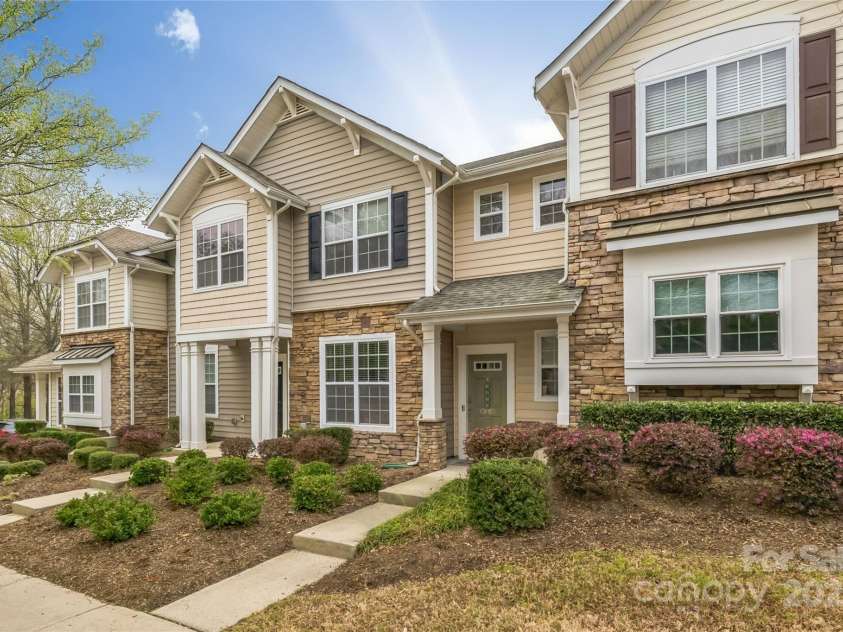 8009 Whitehawk Hill Road, Waxhaw, NC 28173.  MLS# CAR4232872, YatesRealty ID 16475. Charming brick-front townhome with fenced patio in the heart of Cureton.