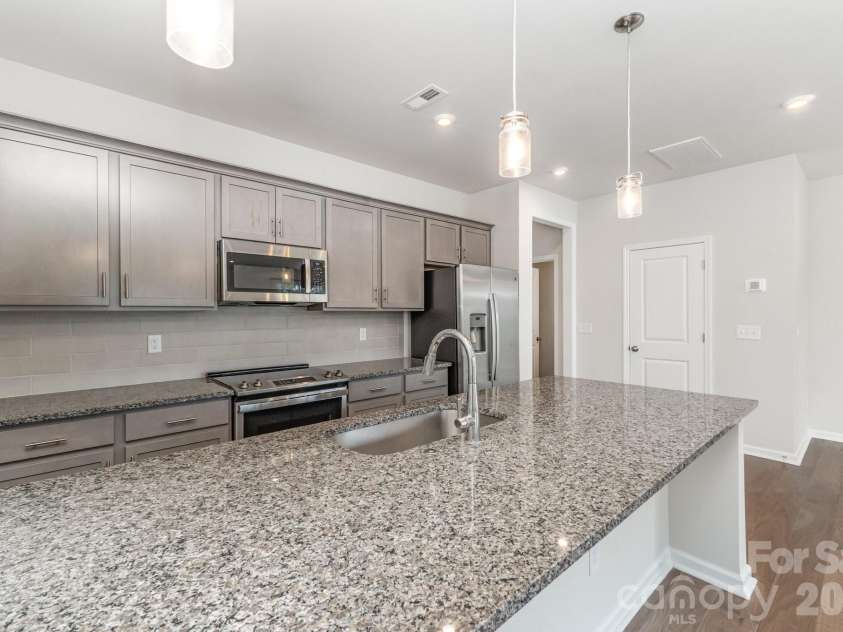 9029 Widden Way, Charlotte, NC 28269.  MLS# CAR4307249, YatesRealty ID 16476. Huge Island