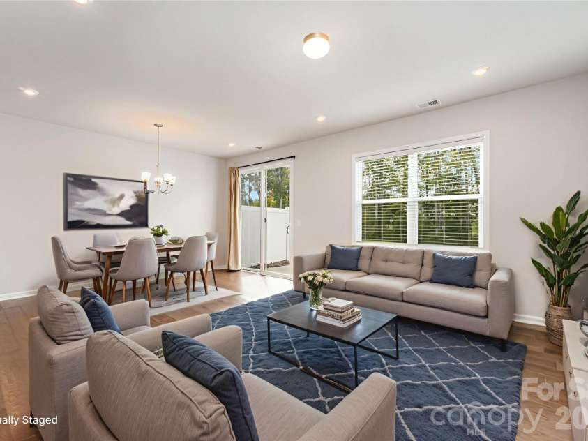 9029 Widden Way, Charlotte, NC 28269.  MLS# CAR4307249, YatesRealty ID 16476. Virtually staged living room
