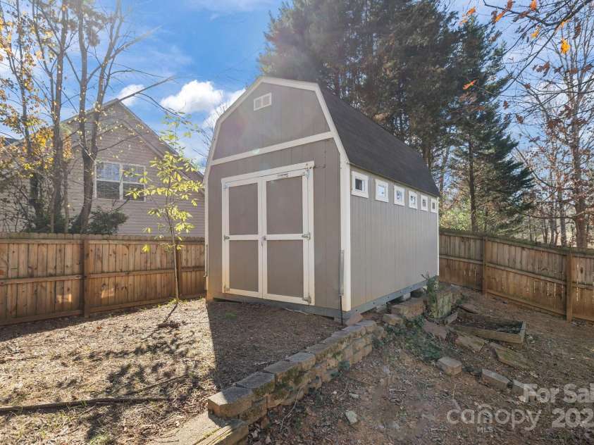 2426 Tory Oak Place, Matthews, NC 28105.  MLS# CAR4329901, YatesRealty ID 1648. Shed Conveys