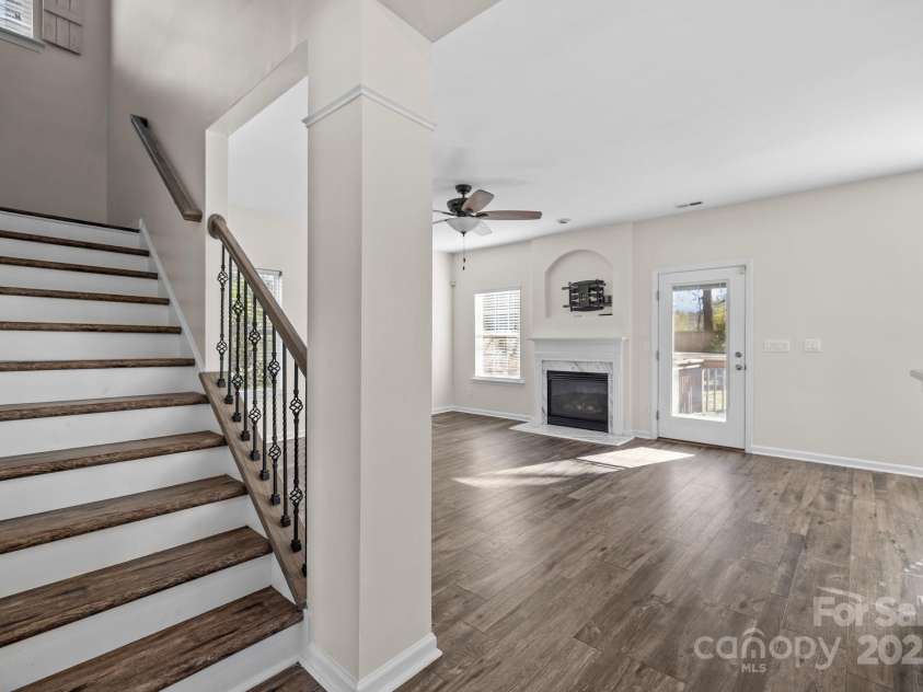 2426 Tory Oak Place, Matthews, NC 28105.  MLS# CAR4329901, YatesRealty ID 1648. Staircase/Living Room