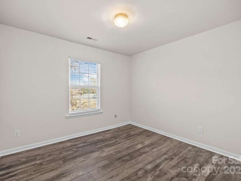 2426 Tory Oak Place, Matthews, NC 28105.  MLS# CAR4329901, YatesRealty ID 1648. Third Bedroom Upstairs