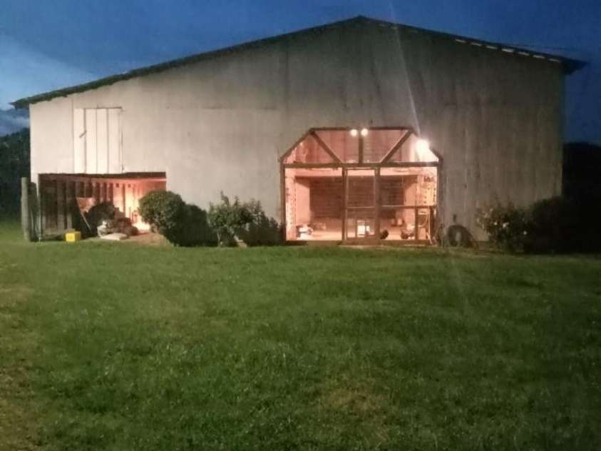 16351 Substation Road, Locust, NC 28097.  MLS# CAR4366804, YatesRealty ID 16481. Barn at night