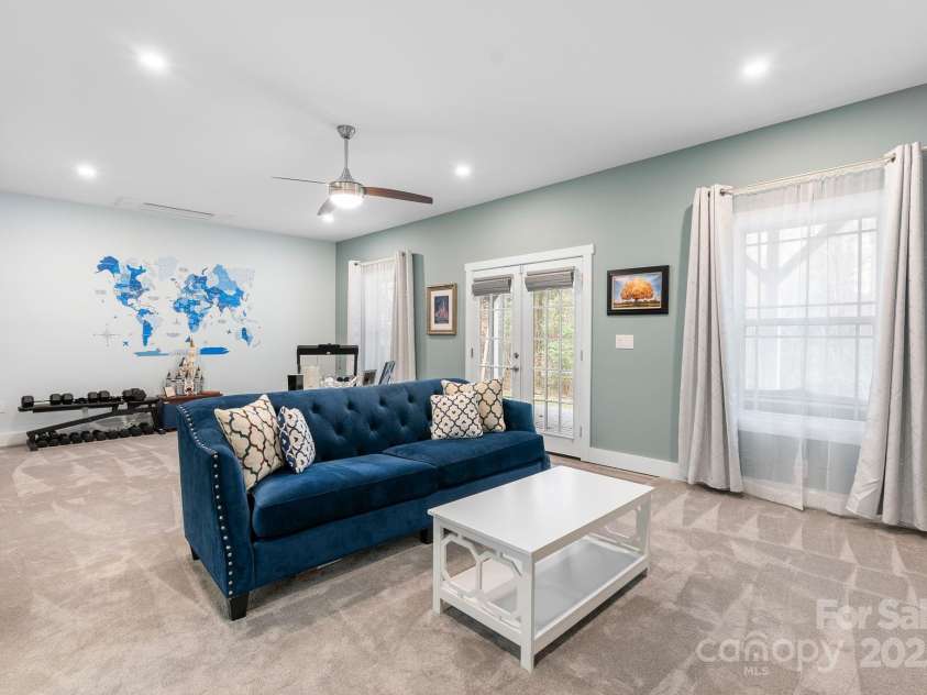 353 Olivet Lane, Fletcher, NC 28732.  MLS# CAR4226055, YatesRealty ID 16483. Basement den