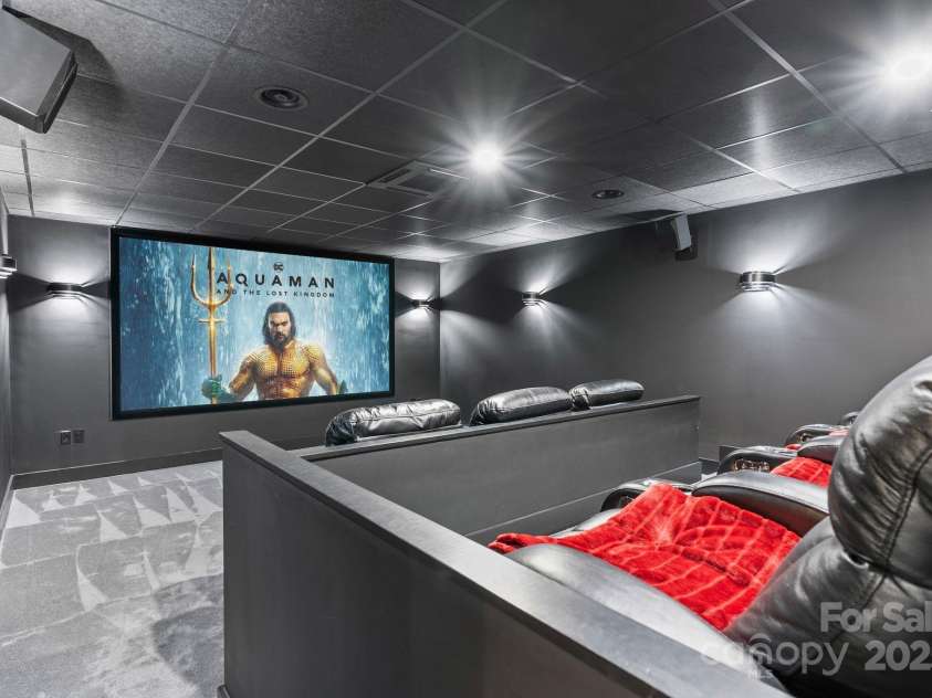 353 Olivet Lane, Fletcher, NC 28732.  MLS# CAR4226055, YatesRealty ID 16483. Basement theater room