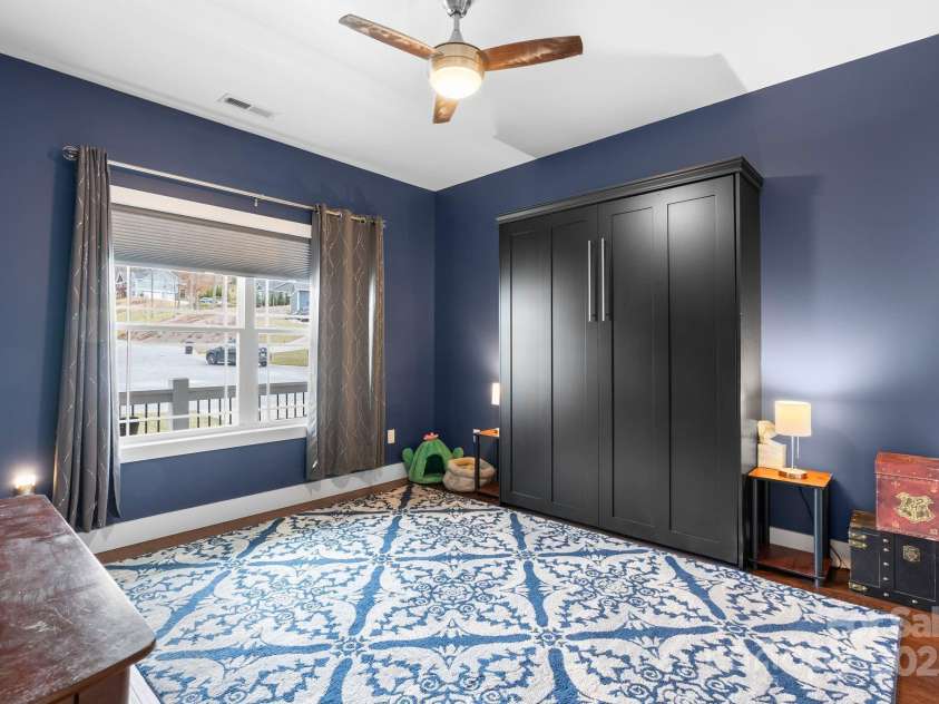 353 Olivet Lane, Fletcher, NC 28732.  MLS# CAR4226055, YatesRealty ID 16483. Bedroom #3 with murphy bed option